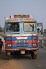 Image showing Typical, colorful, decorated public transportation bus in Kumrokhali, West Bengal, India