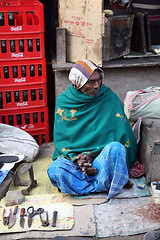 Image showing Shoemaker working at the streets of Baruipur, West Bengal, India