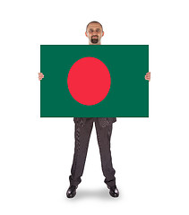 Image showing Businessman holding a big card, flag of Bangladesh