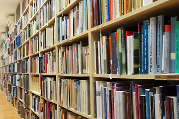 Image showing Bookshelf in library with many books