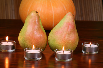 Image showing Pears and tealights