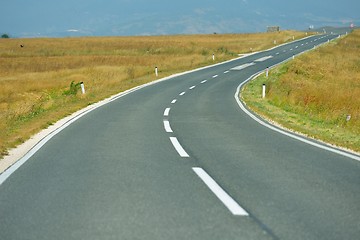 Image showing road through the green field