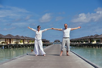 Image showing happy young couple have fun on beach