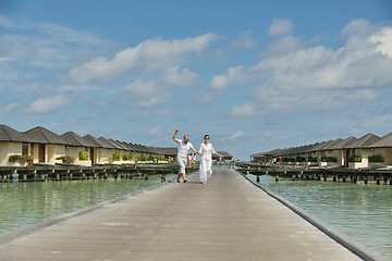 Image showing happy young couple have fun on beach