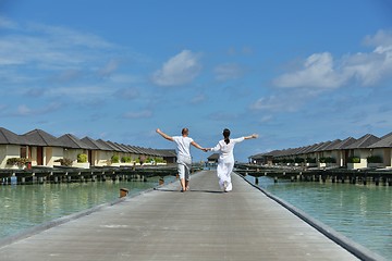 Image showing happy young couple have fun on beach