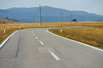 Image showing road through the green field