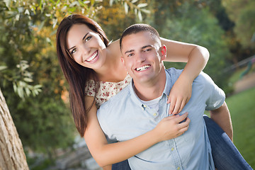 Image showing Mixed Race Romantic Couple Portrait in the Park