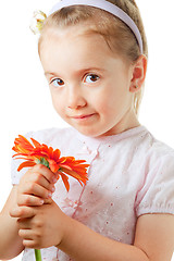 Image showing Pretty little girl with flower