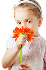 Image showing Pretty little girl with flower