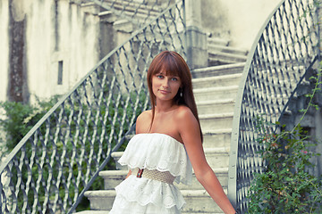 Image showing Beautiful woman near old palace