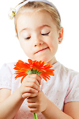 Image showing Funny little girl with flower