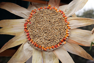 Image showing Colorful handmade flowers made of corn