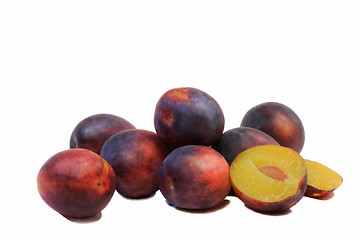 Image showing Large ripe plums on a white background.