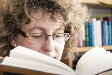 Image showing Beautiful woman reading a book