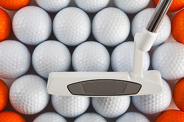 Image showing Golf putter and balls