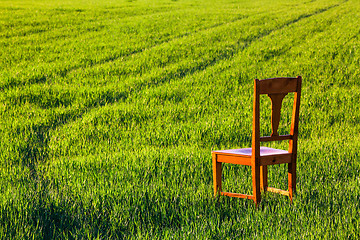 Image showing Abandoned chair on the field