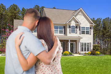 Image showing Military Couple Looking at Nice New House