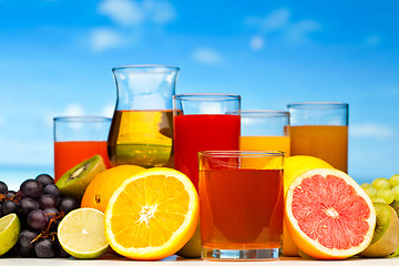 Image showing glasses of juice, fruits