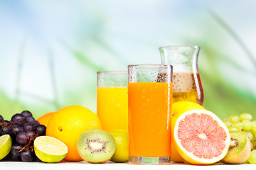 Image showing glasses of juice, fruits