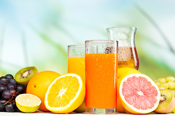 Image showing glasses of juice, fruits