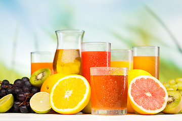 Image showing glasses of juice, fruits