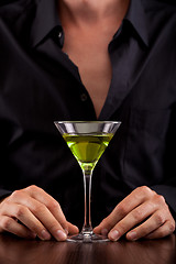 Image showing Bartender pours drink