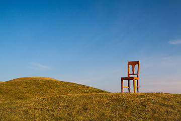 Image showing The old chair on the golf course