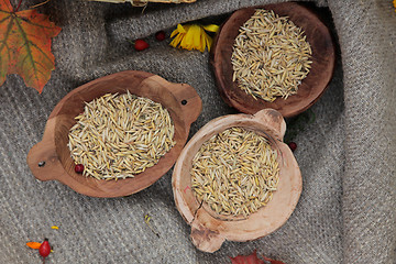 Image showing Wheat in a wooden bowl