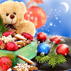 Image showing Christmas toys, cookies and an old vinyl record. 