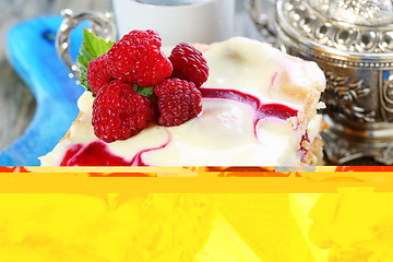 Image showing Puff pastry cake decorated with raspberries.