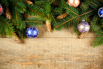 Image showing christmas fir tree with pinecones and decorations 