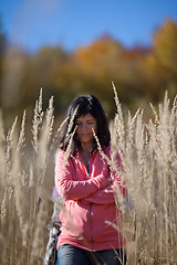 Image showing Woman on autumn meadow