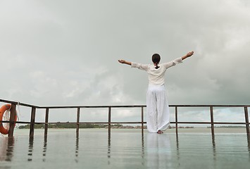 Image showing young woman relax on cloudy summer day