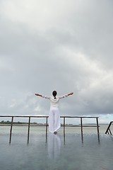 Image showing young woman relax on cloudy summer day