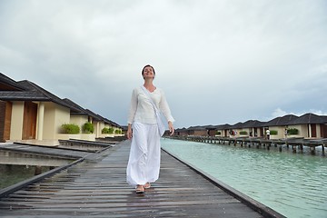 Image showing young woman relax on cloudy summer day