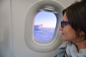 Image showing woman in airplane travel