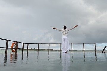 Image showing young woman relax on cloudy summer day