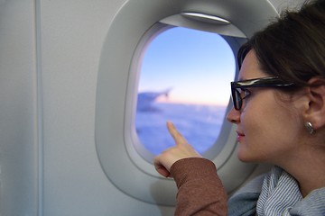 Image showing woman in airplane travel