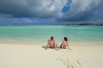 Image showing happy young couple have fun on beach