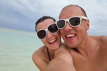 Image showing happy young couple have fun on beach