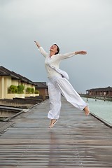 Image showing young woman relax on cloudy summer day