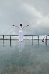 Image showing young woman relax on cloudy summer day