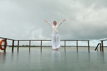 Image showing young woman relax on cloudy summer day