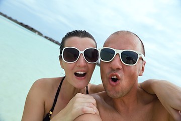 Image showing happy young couple have fun on beach