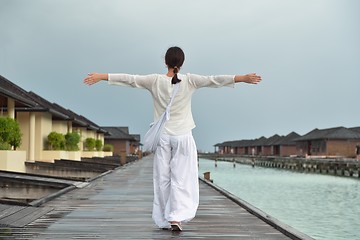 Image showing young woman relax on cloudy summer day