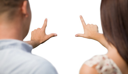 Image showing Military Couple with Framing Hands Slightly Blurry on White