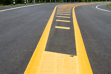 Image showing yellow line on the road texture background