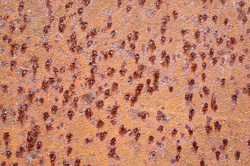 Image showing brown rusty surface with bulges