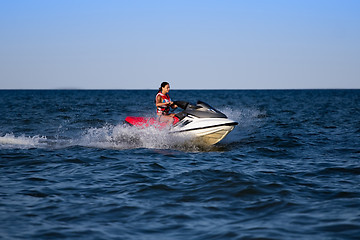 Image showing Brunette on a jetski