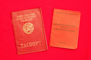 Image showing party card  of CPSU and passport over red